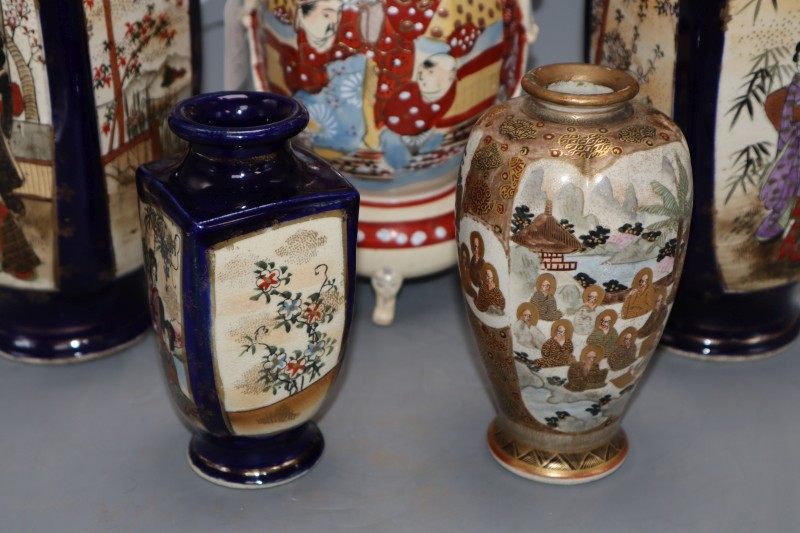 A pair of Japanese vases and three others